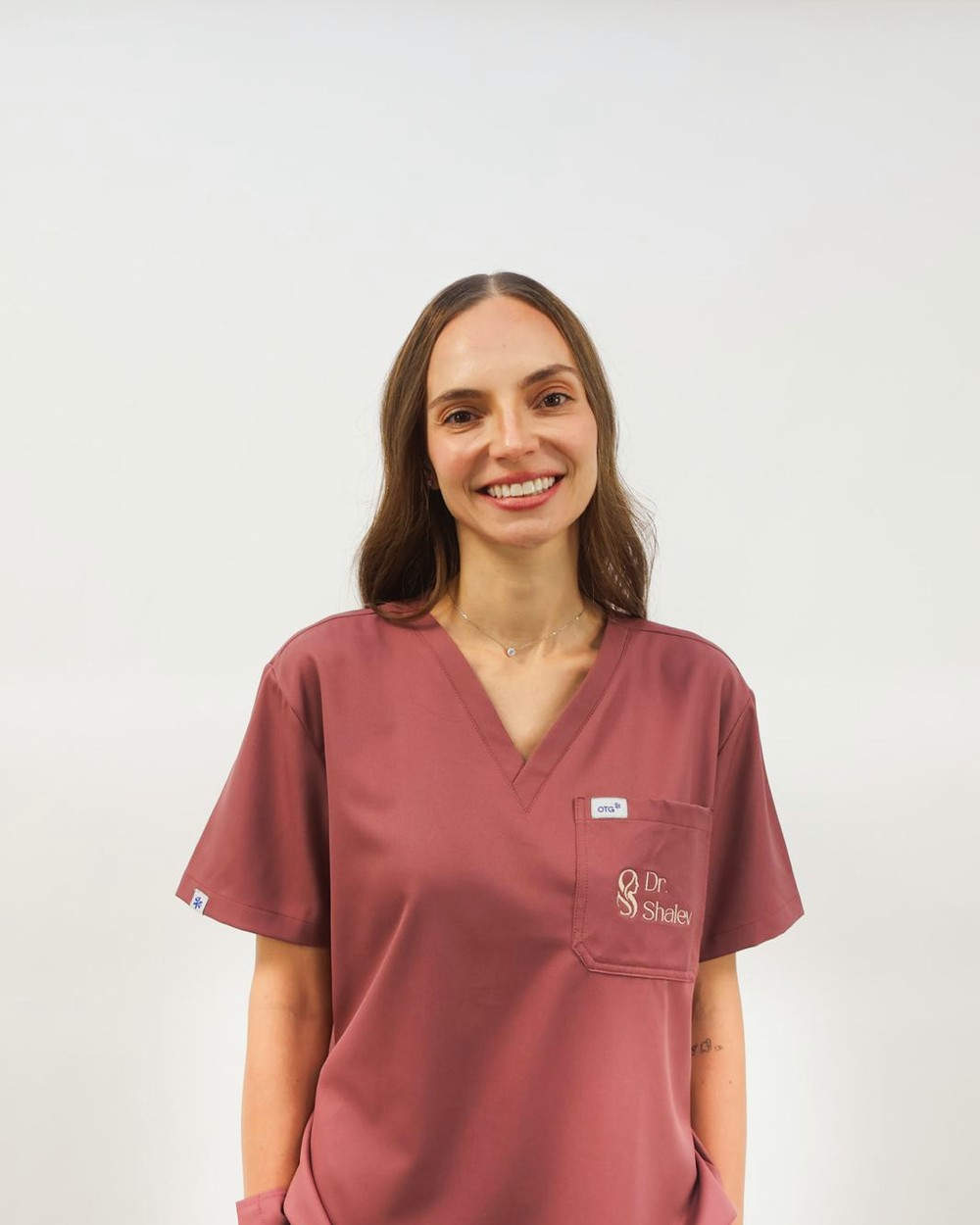 Dr. Maria Shalev in clinic uniform.